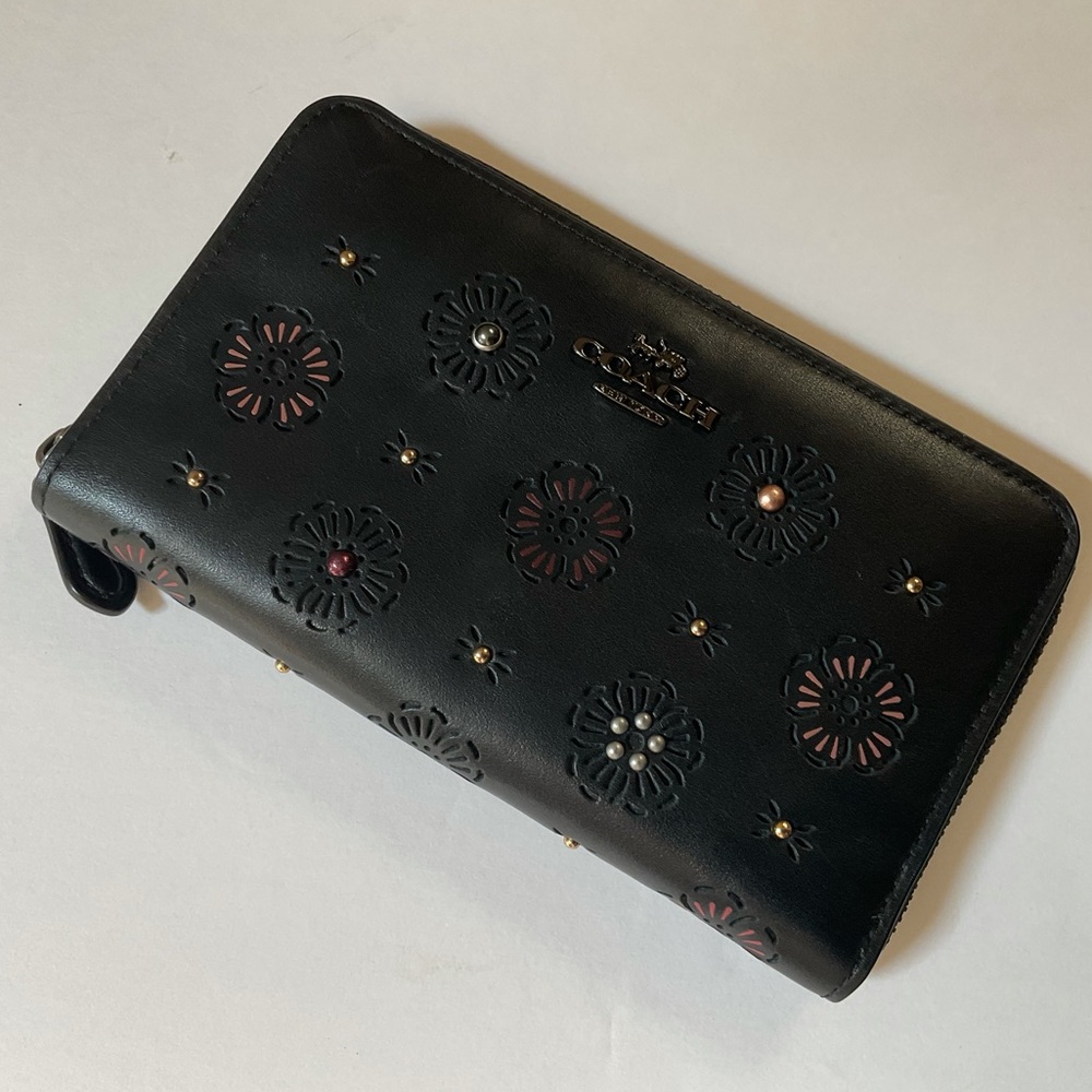 Coach zippered wallet with tea rose cut-out details